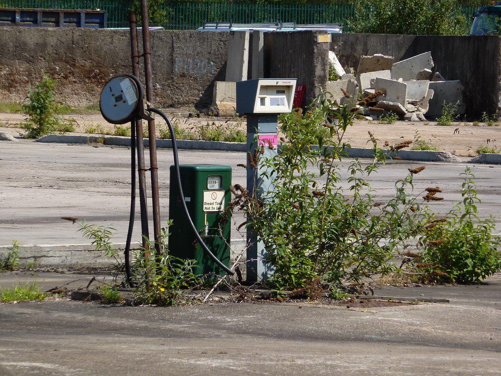 Diesel fuel pump nozzle at truck stop, illustrating fuel price changes affecting carrier operating costs